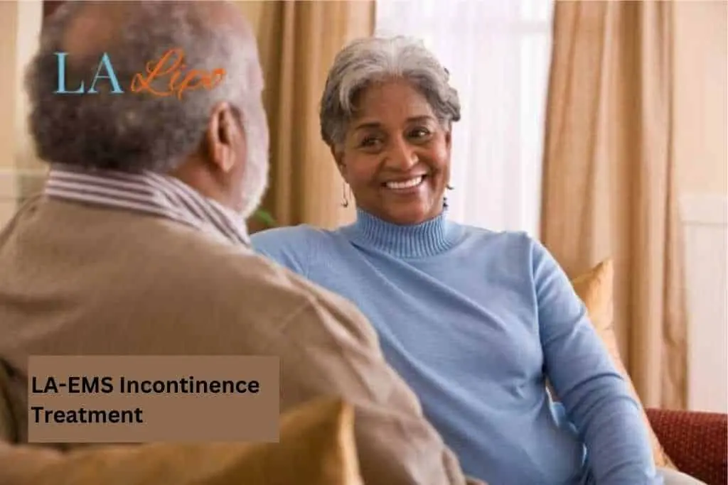 Couple sat smiling at each other - LA-EMS treatment Cheshunt