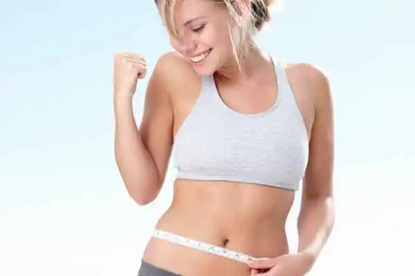 woman happy after fat reduction treatment Cheshunt