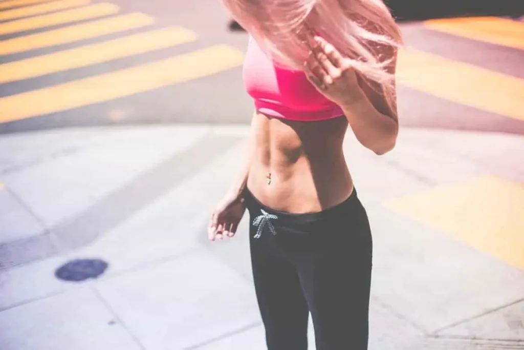 Woman with toned stomach after LA-EMS Body Sculpting Treatment Cheshunt 